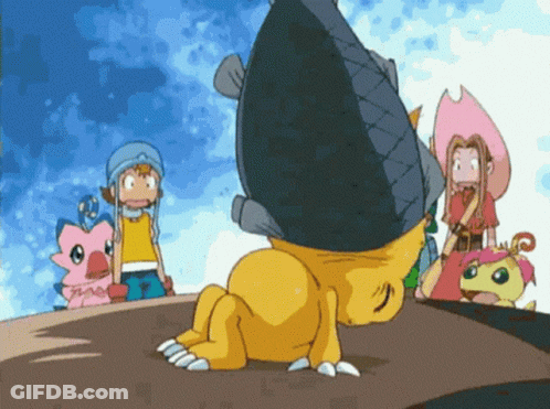 A Group Of Cartoon Characters Are Standing Around A Cartoon Character Laying On Its Back GIF