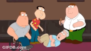 A Group Of Cartoon Characters Are Standing Around A Man Laying On The Floor GIF