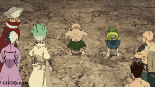 A Group Of Cartoon Characters Are Standing In A Circle And One Of Them Has A Green Fan On His Head GIF