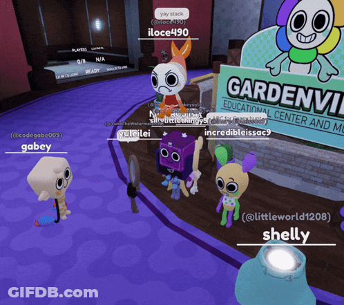A Group Of Cartoon Characters Are Standing In Front Of A Gardenvil Educational Center And Museum Sign GIF
