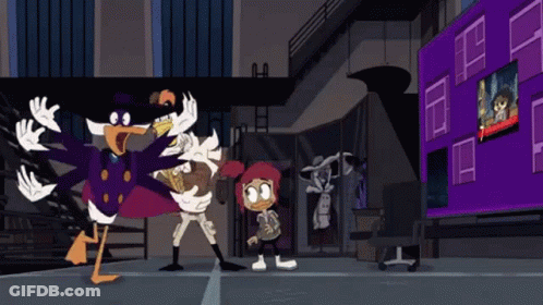 A Group Of Cartoon Characters Are Standing In Front Of A Large Screen That Says ' Ducktales ' On It GIF
