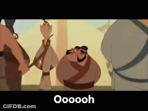 A Group Of Cartoon Characters Are Standing Next To Each Other And One Of Them Is Holding A Stick . GIF