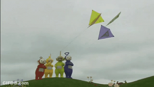 A Group Of Cartoon Characters Flying Kites On A Hill GIF
