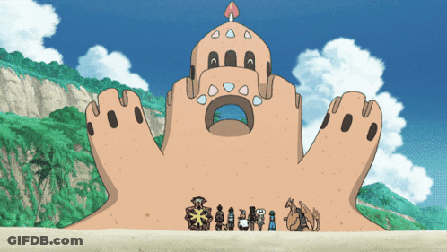 Cartoon Characters Standing In Front Of Sand Castle GIF