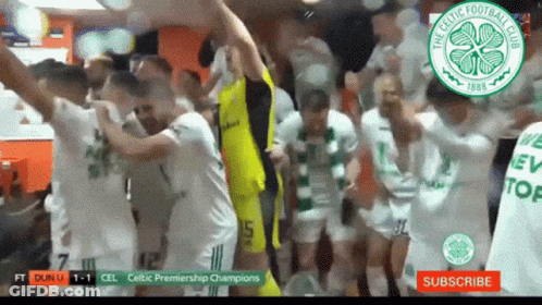 A Group Of Celtic Football Players Celebrate In A Dressing Room GIF