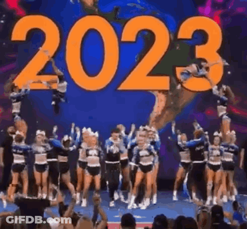 Cheerleaders Jumping In Front Of 2023 Sign GIF