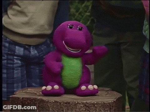 A Group Of Children Are Standing In Front Of A Large Purple Object With A Compass On It GIF