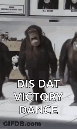 A Group Of Chimpanzees Are Dancing Together In A Room With The Words `` Dis Dat Victory Dance '' . GIF