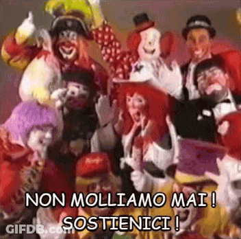 A Group Of Clowns Are Posing For A Picture And The Caption Says Non Molliamo Mai Sostienici GIF