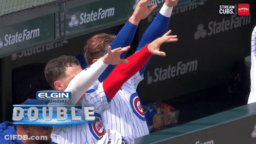 A Group Of Cubs Players Are Doing A Double GIF