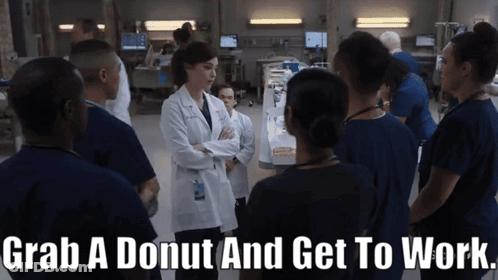 A Group Of Doctors Are Gathered Around A Woman In A Lab Coat With The Words Grab A Donut And Get To Work Below GIF