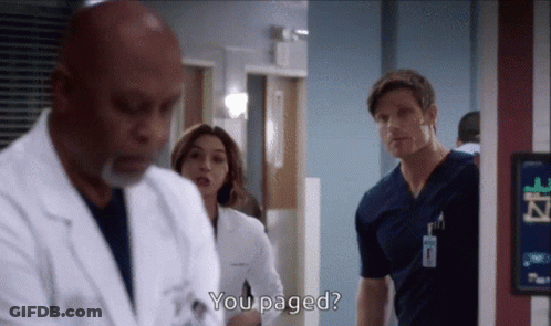 Doctors In Hospital Hallway One Asking If Paged GIF