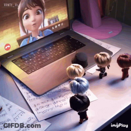 A Group Of Dolls Are Standing In Front Of A Laptop That Says Vante_vi On The Screen GIF