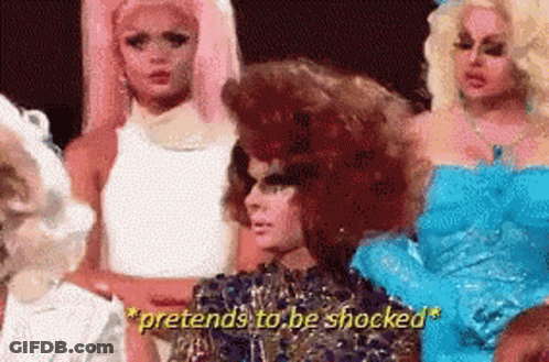 A Group Of Drag Queens Are Standing Next To Each Other And One Of Them Is Saying Pretends To Be Shocked GIF