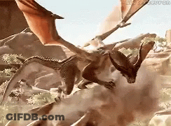 A Group Of Dragons Are Flying Over A Rocky Area . GIF
