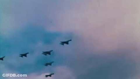 A Group Of Fighter Jets Are Flying In Formation GIF