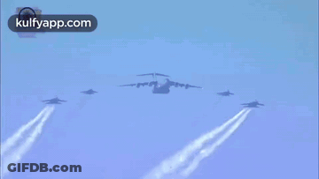 Fighter Jets Flying Through Blue Sky GIF