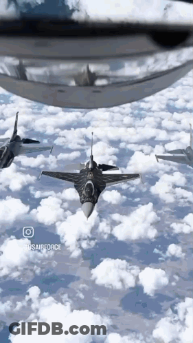 A Group Of Fighter Jets Are Flying Through The Clouds With The Words Corsairforce On The Bottom GIF