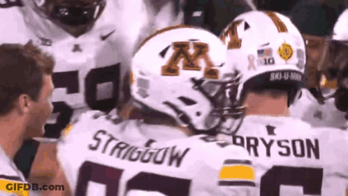 A Group Of Football Players Are Huddled Together And One Of The Players Is Named Strigiow GIF
