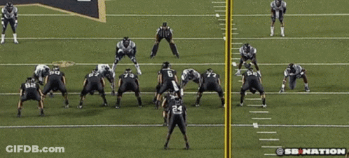 A Group Of Football Players Are On A Field And One Of Them Has The Number 24 On Their Jersey GIF