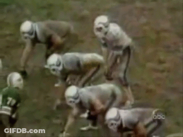 A Group Of Football Players Are On A Field And One Of Them Has The Number 78 On His Jersey GIF