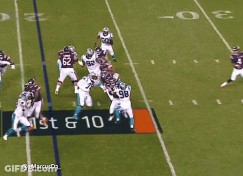A Group Of Football Players Are Playing On A Field With An Arrow Pointing To The Left And Right GIF