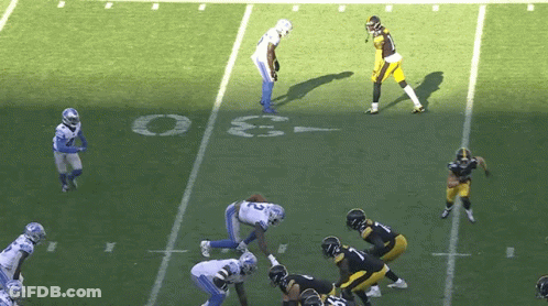 A Group Of Football Players Are Playing On A Field With The Number 3 On The Sidelines GIF