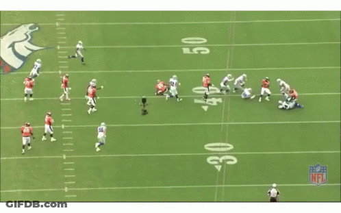 A Group Of Football Players Are Running On A Field With A Nfl Logo In The Background GIF