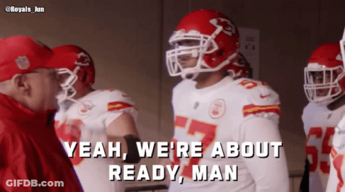 A Group Of Football Players Are Standing In A Locker Room And One Of Them Says Yeah We 'Re About Ready Man GIF
