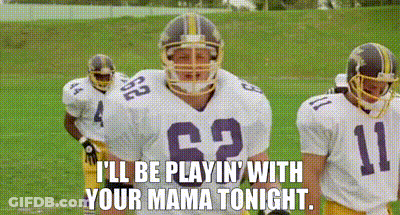 A Group Of Football Players Are Standing On A Field And One Of Them Is Wearing The Number 62 Jersey . GIF