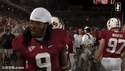 A Group Of Football Players Including Murphy Number 97 GIF