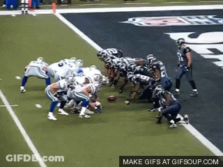 A Group Of Football Players On A Field With A Make Gifs At Gifsoup.com Logo GIF