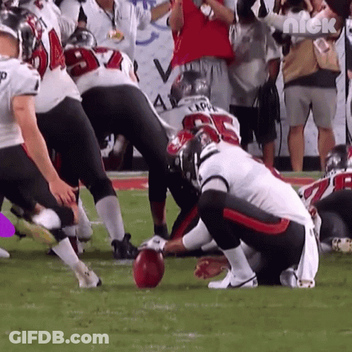 A Group Of Football Players On A Field With A Nick Logo In The Corner GIF