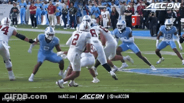 A Group Of Football Players On A Field With Accon Written On The Bottom GIF