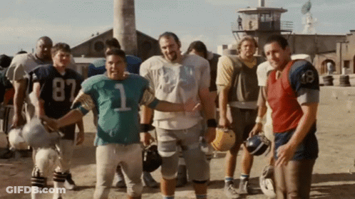 A Group Of Football Players One Of Whom Is Wearing Number 1 GIF