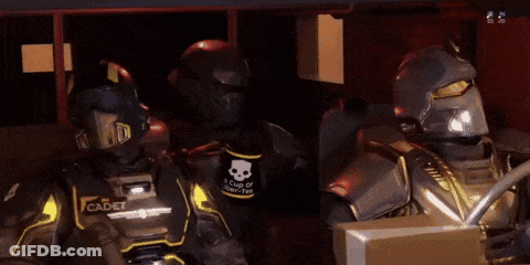A Group Of Futuristic Soldiers With The Word Cadet On Their Armor GIF