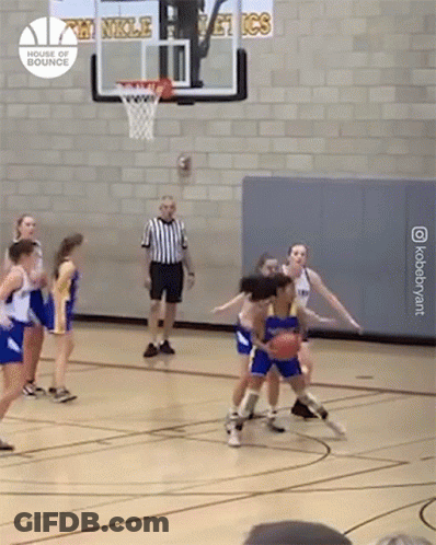 A Group Of Girls Are Playing Basketball On A Court With A Sign That Says ' Double Bounce ' GIF
