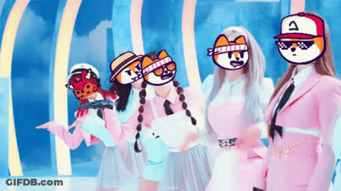 A Group Of Girls Are Posing For A Picture With Cartoon Faces On Their Heads GIF