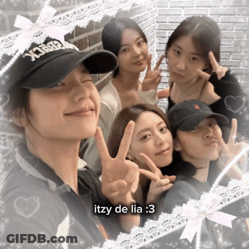 A Group Of Girls Are Posing For A Picture With The Caption Itzy De Lia 3 GIF