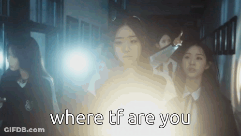 A Group Of Girls Are Standing In A Dark Hallway With The Words " Where Tf Are You " GIF