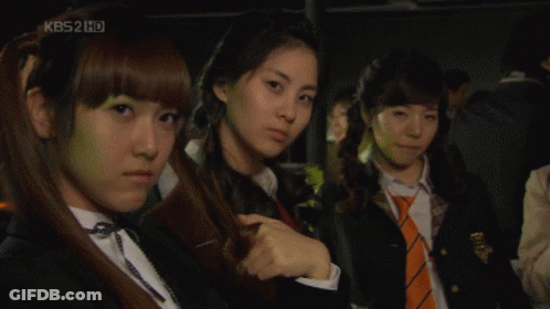 A Group Of Girls Are Standing In Front Of A Kbs2 Hd Screen GIF