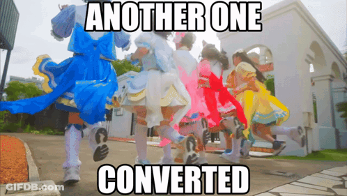 A Group Of Girls In Colorful Dresses Are Walking In Front Of A Building With The Caption Another One Converted GIF