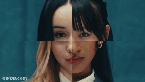 A Group Of Girls In School Uniforms Are Posing For A Picture With The Word Dream In The Background GIF