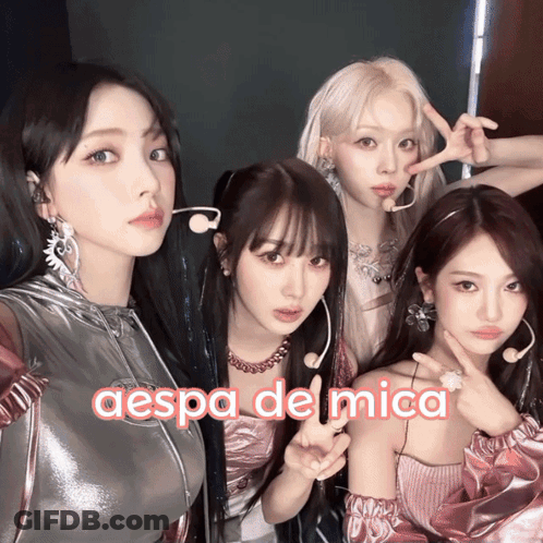 A Group Of Girls Posing For A Picture With The Words Aespa De Mica On The Bottom Right GIF