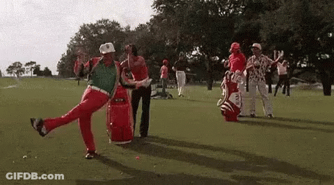 A Group Of Golfers Are Dancing On A Golf Course While Holding Golf Bags . GIF