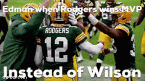 A Group Of Green Bay Packers Players Celebrate A Win GIF