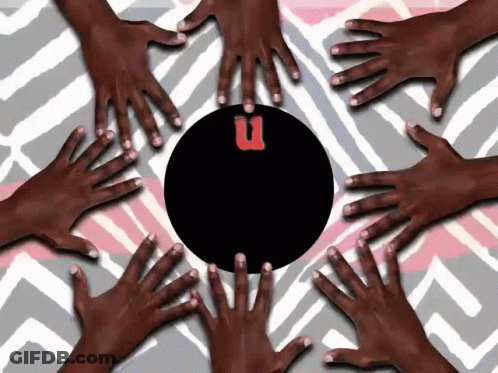 A Group Of Hands Are Reaching For A Black Circle With The Letter U On It GIF