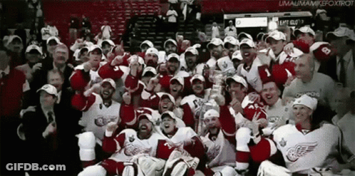 A Group Of Hockey Players Are Posing For A Photo With A Caption That Says Limaumamickfoxtrot GIF