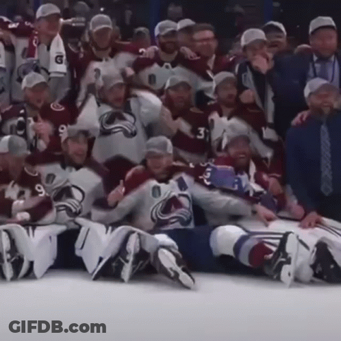 A Group Of Hockey Players Are Posing For A Picture And One Of Them Has The Number 3 On His Jersey GIF