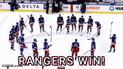 A Group Of Hockey Players Standing On A Rink With The Words Rangers Win On The Bottom GIF